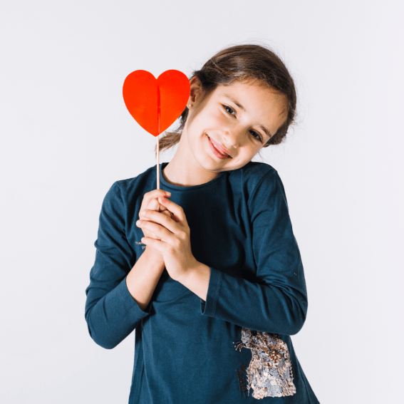 Girl holding heart